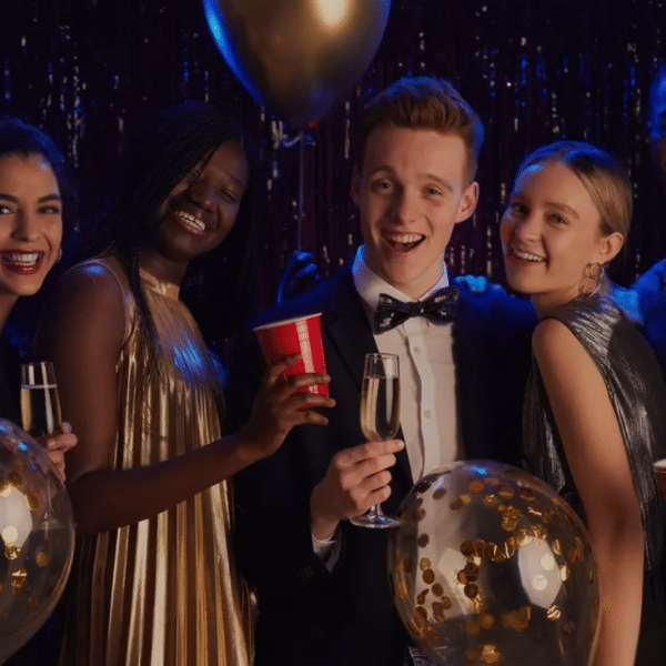 Image showing high schoolers at a prom or formal.